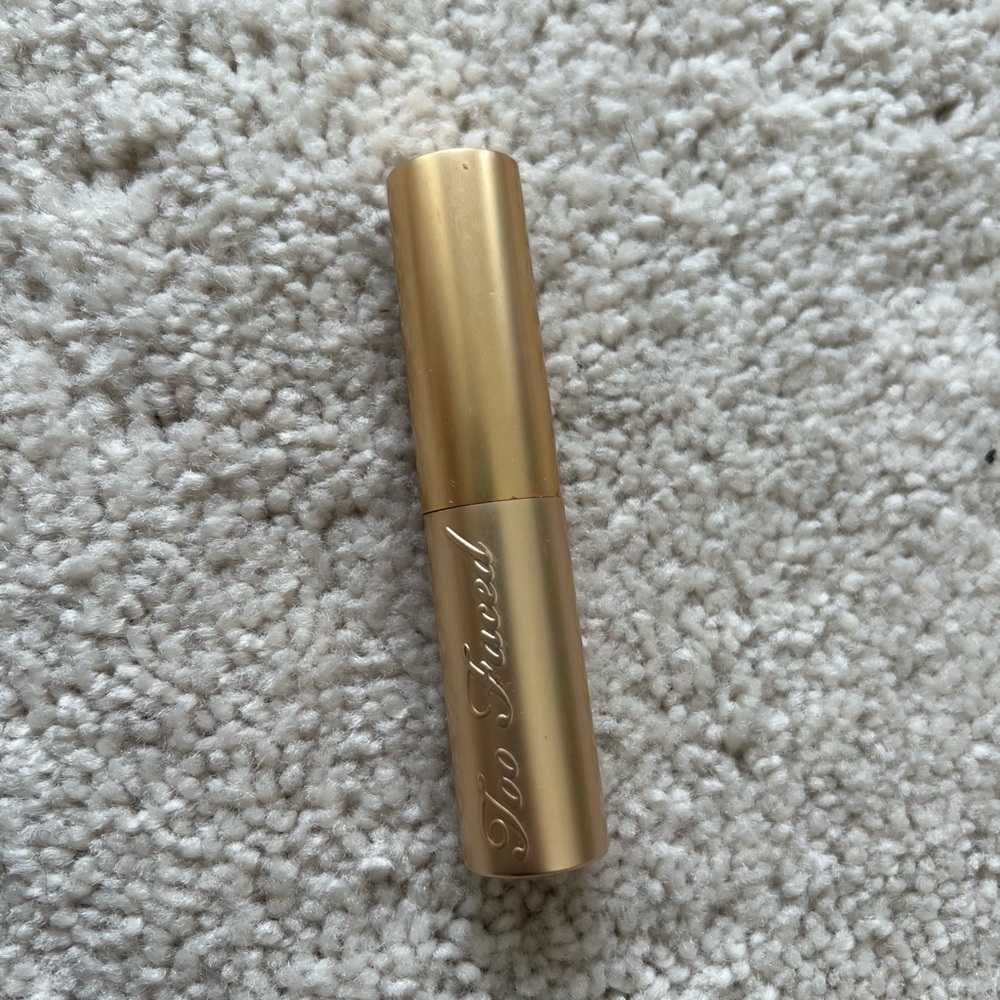 Too Faced La Crème Lipstick in “Naughty Nude” lightly used